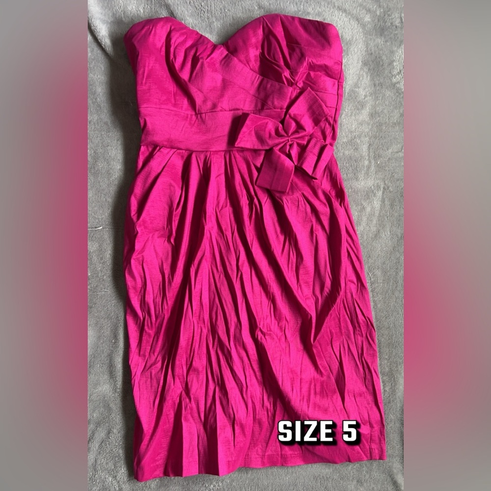 Pink strapless dress with bow. Size 5.